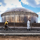 Workers clean up an oil spill after Hurricane Dorian.